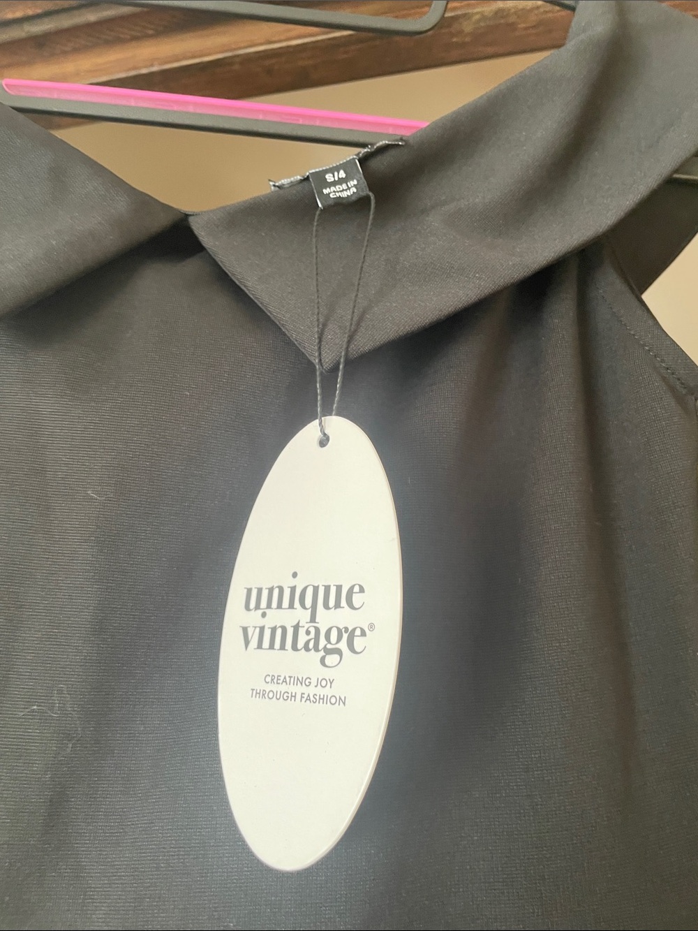 Unique Vintage Black Women's Sleeveless Top with Folded Collar